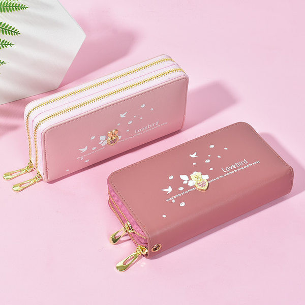 Moderns sieviešu maks ar rāvējslēdzējiem un monētu nodalījumu