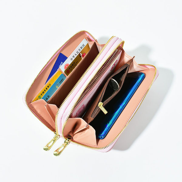 Moderns sieviešu maks ar rāvējslēdzējiem un monētu nodalījumu