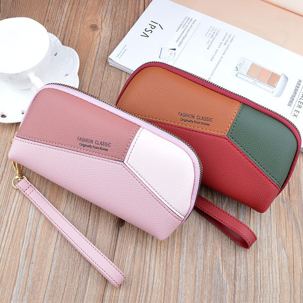 Ādas sieviešu maks ar uzrakstu un rokturi