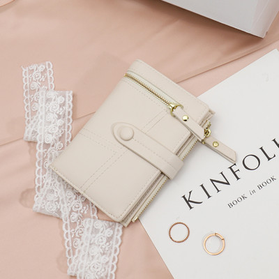 Sieviešu somiņa ar rāvējslēdzējiem un karšu nodalījumiem