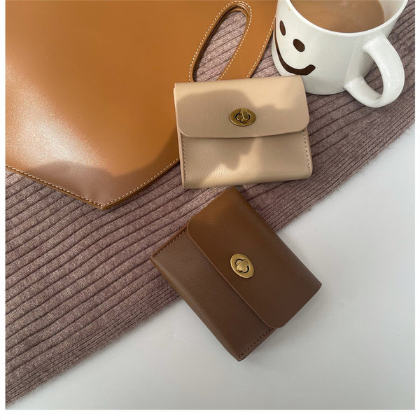 Portofel de dama din piele ecologica cu inchizatoare metalica model uni