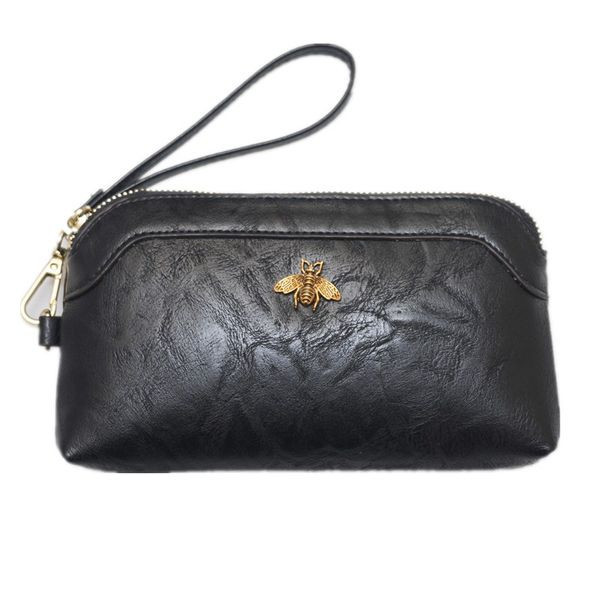 Sieviešu ādas maks ar rokturi un metāla elementu