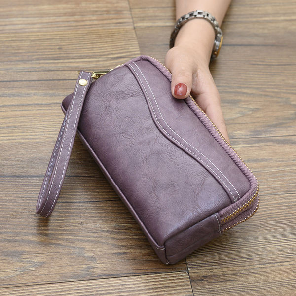 Liels funkcionāls maks ar dubultu rāvējslēdzēju