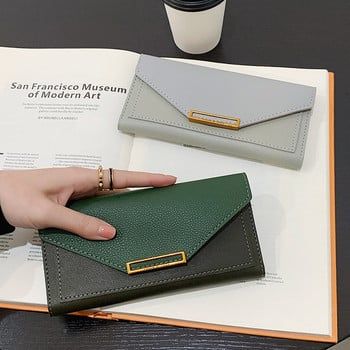 Дамски кожен портфейл с метално закопчаване - дълъг модел