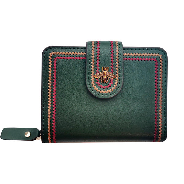 Sieviešu ādas maks ar metāla apdari un izšuvumu trīs krāsās