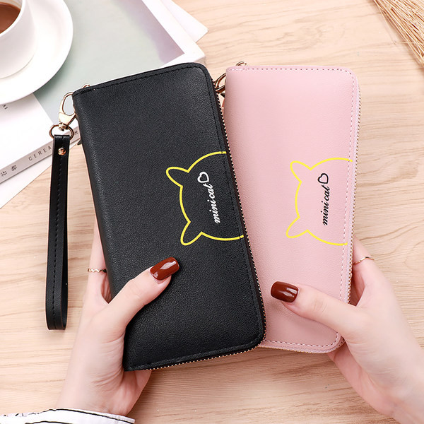 Portofel de dama din piele cu maner si pandantiv