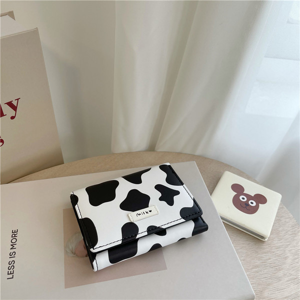 Daudzfunkcionāls sieviešu maks ar dzīvnieku apdruku - eko āda