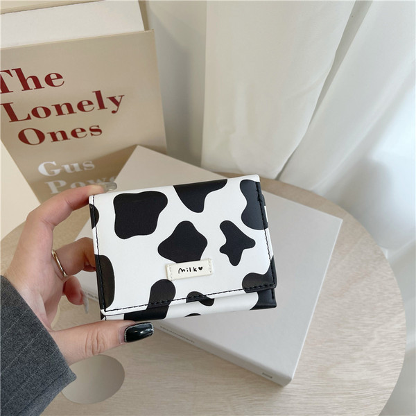 Daudzfunkcionāls sieviešu maks ar dzīvnieku apdruku - eko āda