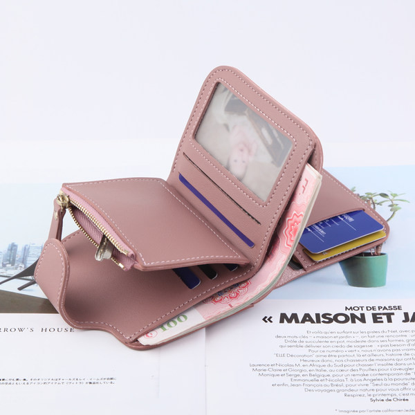 Sieviešu mini maks ar rāvējslēdzēju un metāla aizdari