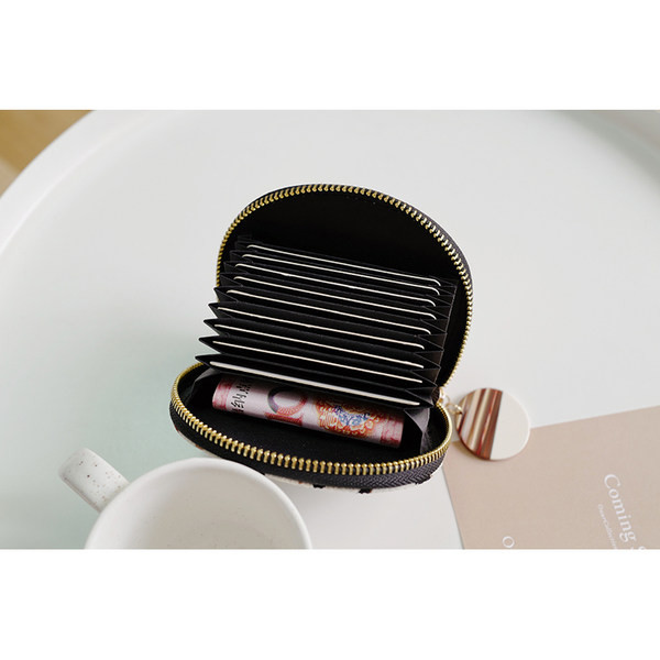 Sieviešu mini maks ar aplikācijām un metāla elementu