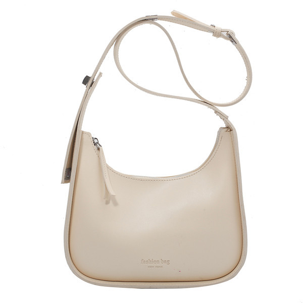 Sieviešu ādas soma ar regulējamu rokturi