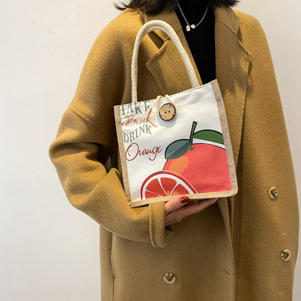 Sieviešu audekla soma ar aplikācijām