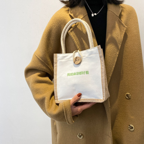 Sieviešu audekla soma ar aplikācijām