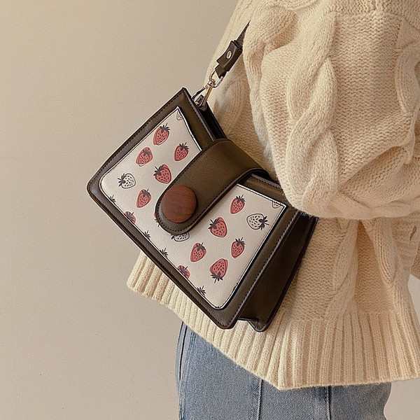 Jauns sieviešu somas modelis ar aplikāciju divās krāsās