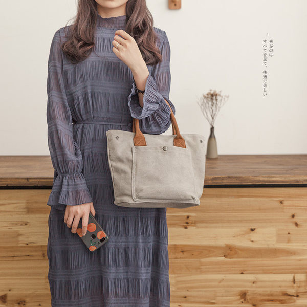 Ženska platnena torba s prednjim džepom i ručkom