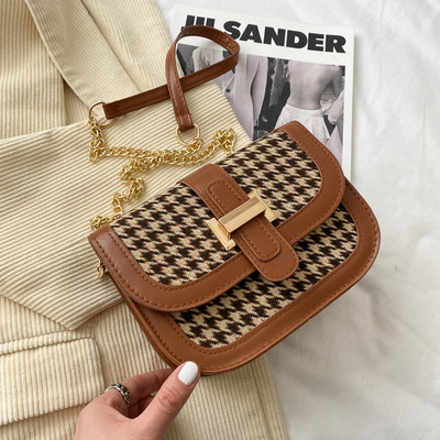 Sieviešu somas jauns modelis ar metāla aizdari un garu rokturi