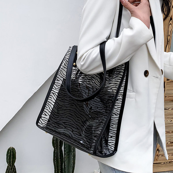 Sieviešu caurspīdīga plecu soma