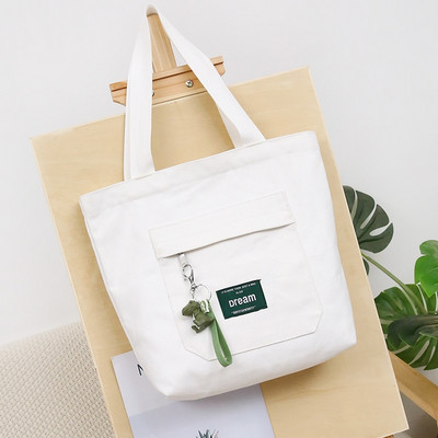 Sieviešu audekla soma ar priekšējo kabatu un plecu rokturiem