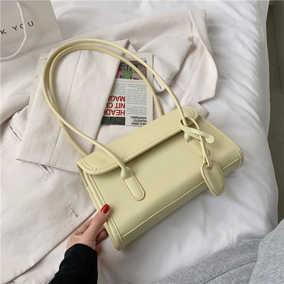 Geanta de dama moderna din piele cu maner scurt si inchidere metalica