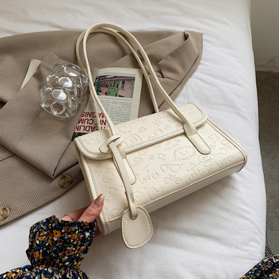 Geanta de dama moderna din piele cu maner scurt si inchidere metalica