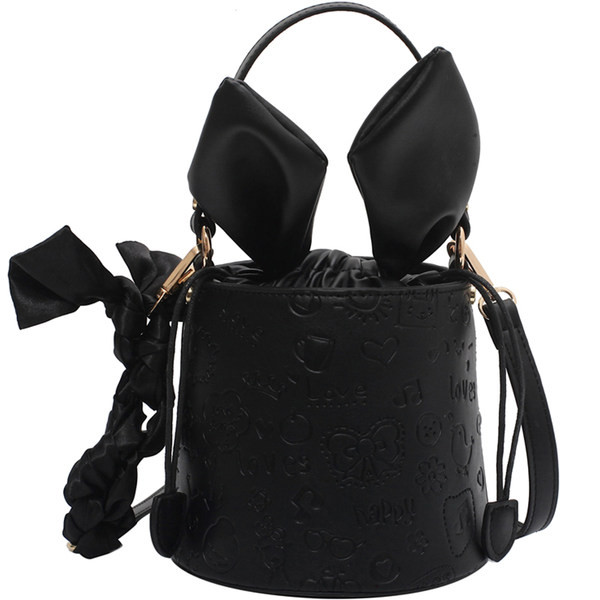 Geanta de dama in forma rotunda cu maner lung si scurt din piele gofrata