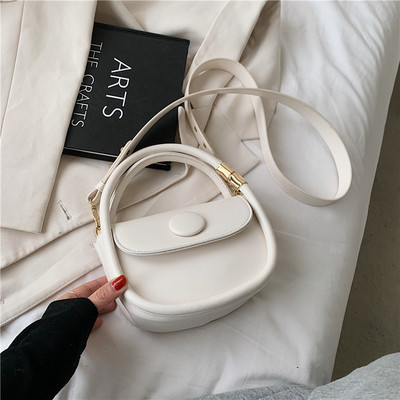 Moderna sieviešu soma ar garu un īsu rokturi