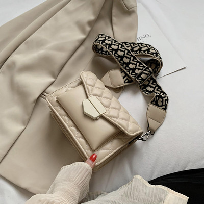 Moteriška odinė rankinė per petį - su reguliuojama rankena