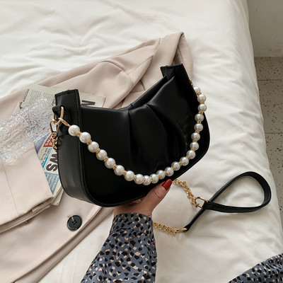 Γυναικεία έκο δερμάτινη τσάντα με κοντή  λαβή από πέρλες και μακριά μεταλλική λαβή