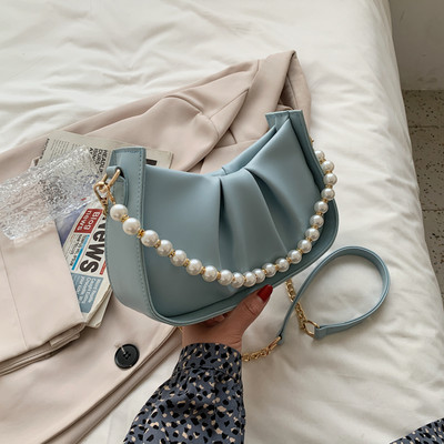 Γυναικεία έκο δερμάτινη τσάντα με κοντή  λαβή από πέρλες και μακριά μεταλλική λαβή