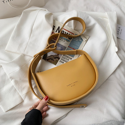 Γυναικεία καθημερινή τσάντα από οικολογικό δέρμα με επιγραφή