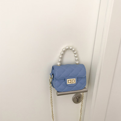 Γυναικεία τσάντα από οικολογικό δέρμα με δύο λαβές και μεταλλική στερέωση