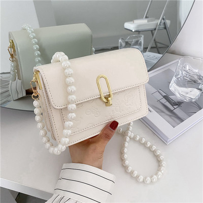 Γυναικεία κομψή τσάντα με πέρλες και μακριά λαβή