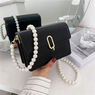 Γυναικεία κομψή τσάντα με πέρλες και μακριά λαβή