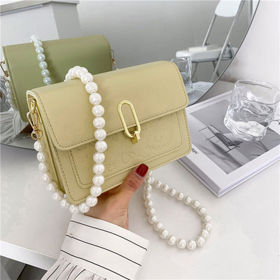 Γυναικεία κομψή τσάντα με πέρλες και μακριά λαβή