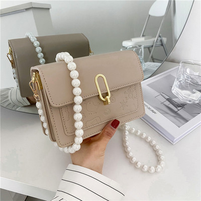 Γυναικεία κομψή τσάντα με πέρλες και μακριά λαβή