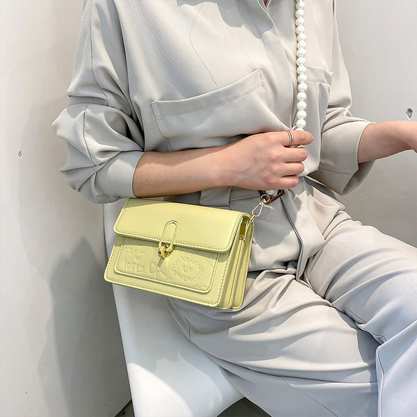 Γυναικεία κομψή τσάντα με πέρλες και μακριά λαβή