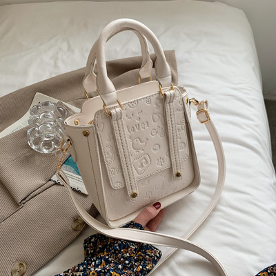 Geanta mica din piele ecologica reliefata si doua manere