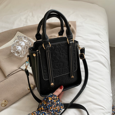 Geanta mica din piele ecologica reliefata si doua manere