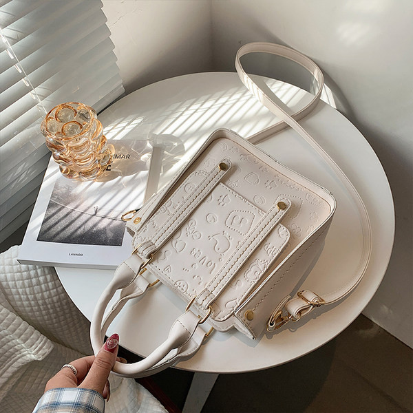 Geanta mica din piele ecologica reliefata si doua manere