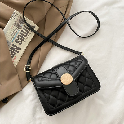 Γυναικεία έκο δερμάτινη τσάντα με μακριά λαβή και μεταλλική στερέωση