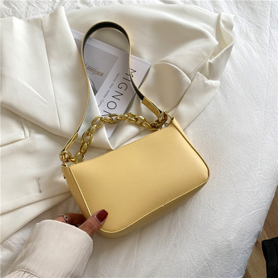 Γυναικεία έκο δερμάτινη τσάντα με μεταλλική αλυσίδα και μακριά λαβή