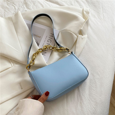 Γυναικεία έκο δερμάτινη τσάντα με μεταλλική αλυσίδα και μακριά λαβή