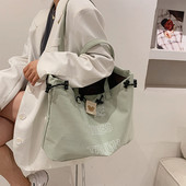 Liela audekla soma, kas piemērota ikdienas lietošanai un pludmalei