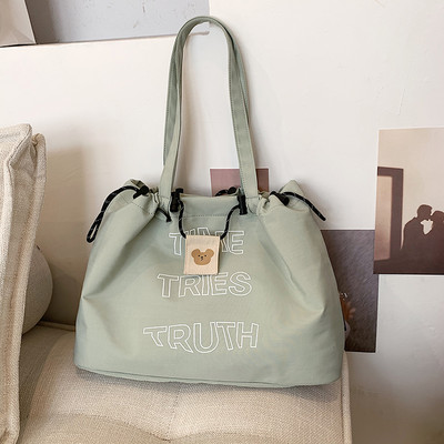 Liela audekla soma, kas piemērota ikdienas lietošanai un pludmalei