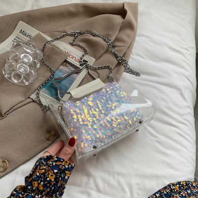 Γυναικεία τσάντα με πούλιες και διαφανές μέρος