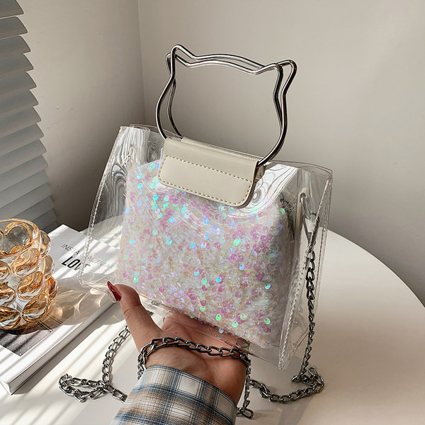 Γυναικεία τσάντα με πούλιες και διαφανές μέρος