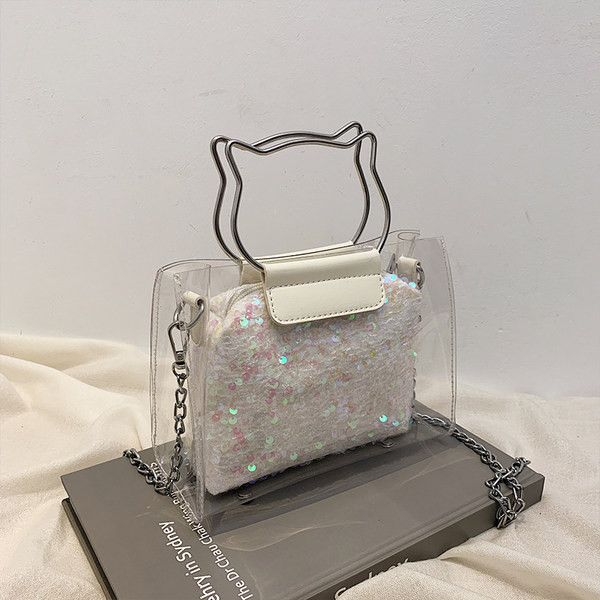 Γυναικεία τσάντα με πούλιες και διαφανές μέρος