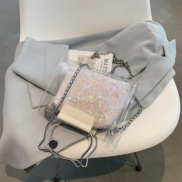 Γυναικεία τσάντα με πούλιες και διαφανές μέρος