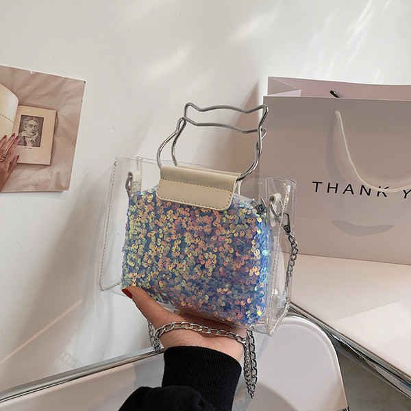 Γυναικεία τσάντα με πούλιες και διαφανές μέρος