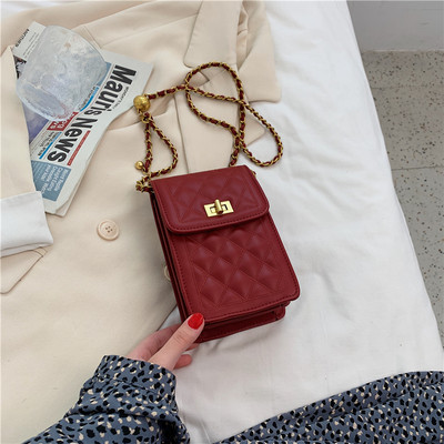 Γυναικεία τσάντα με μεταλλικό κούμπωμα και μακριά λαβή - οικολογικό δέρμα